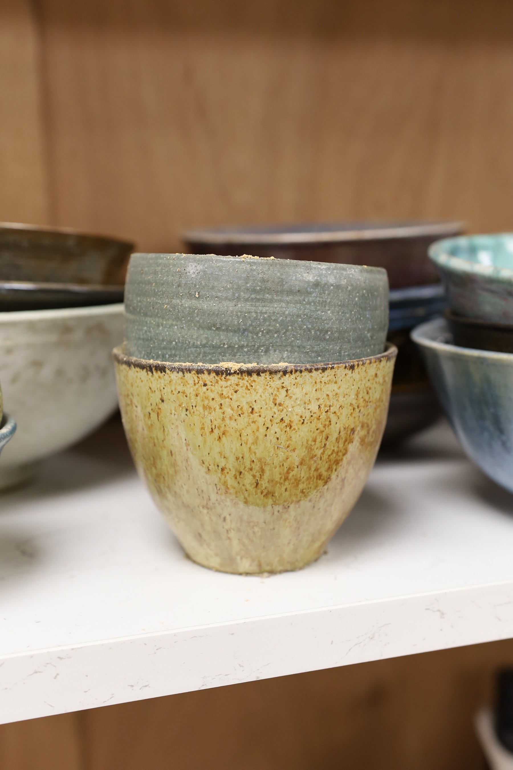 A large quantity of British studio pottery bowls and dishes, to include a vast amount by Susan Threadgold